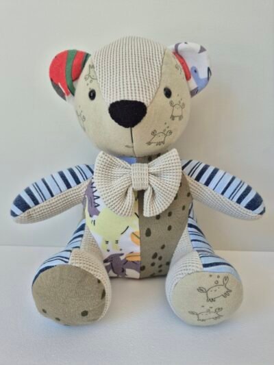 Colorful patchwork memory bear toy made from clothing