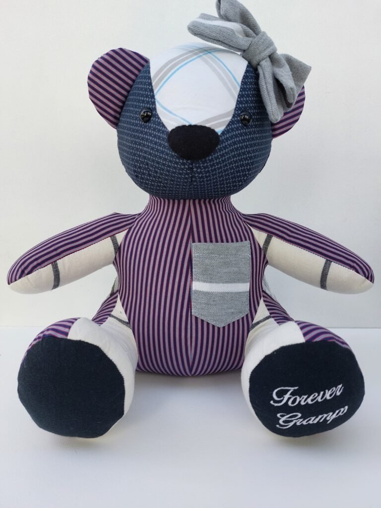 Keepsake bear made from Grandad's clothing with embroidery on the foot as a memorial