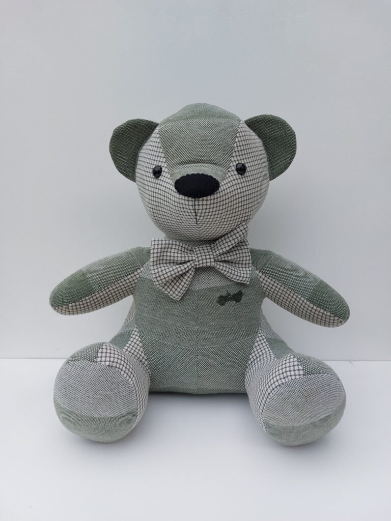 Memory Bear in shades of green with a bow tie
